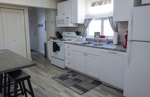 Berkley House | Check this house out! It has a Hot Tub, Gas Fire Pit and Corn Hole!