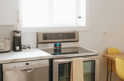 Saskatoon House | Cheerful 2 Bed 1 Bath A/C, + Yard