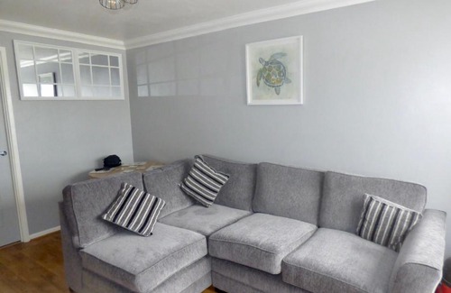 Great Yarmouth Ski Chalet | Cheerful 2 Bed Holiday Chalet with Gated Decking