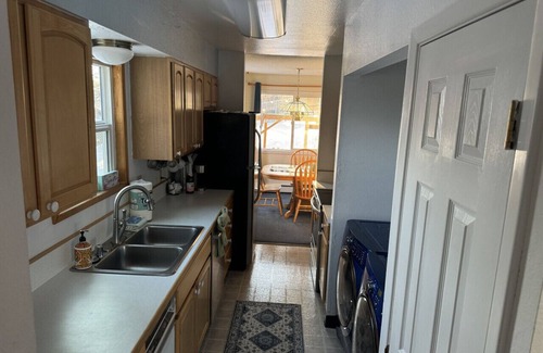 Sand Lake House | Cheerful 4 bedroom home w/HOT TUB close to Airport