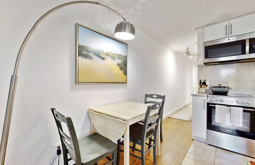 Provincetown Condo | Cheerful condo with enclosed porch, next to Cape Cod Bay with beach access