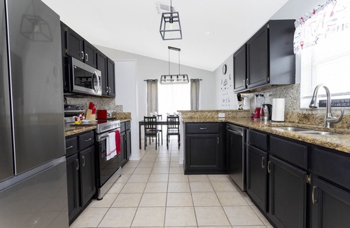 Kissimmee House | Cheerful three bedroom home with Heated Pool in Kissimmee, Florida