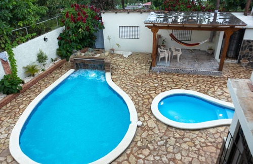 La Vega Province Villa | Cheerful Villa with a pool and15 Minutes away from "La Confluencia"