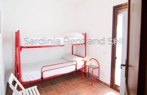 Teulada House | Chia, 6 beds, 2 bathrooms, 150 meters from the sea, air conditioning, patio, garden