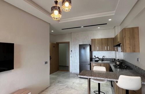 Ain Harrouda Apartment | Chic 1-bedroom apartment with AC, in phenomenal Âïn-Harrouda