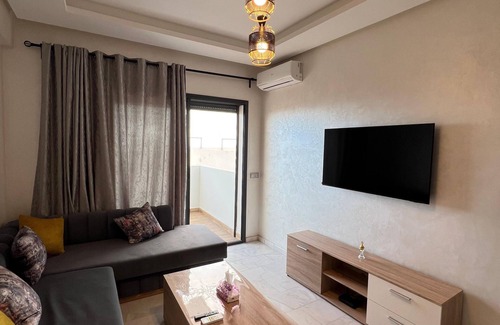 Ain Harrouda Apartment | Chic 1-bedroom apartment with AC, in phenomenal Âïn-Harrouda