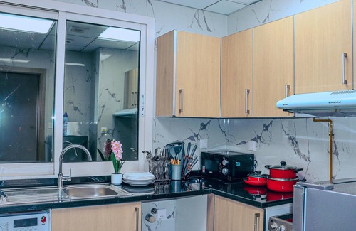 Deira Apartment | Chic 1-bedroom apartment Hall with AC, WiFi in phenomenal Dubai