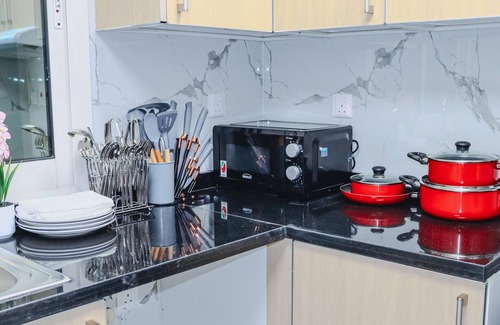 Deira Apartment | Chic 1-bedroom apartment Hall with AC, WiFi in phenomenal Dubai