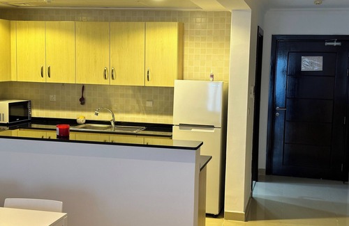 Doha Apartment | Chic 1-bedroom apartment with AC, fitness room, WiFi in enchanting Doha