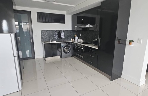 Windhoek Apartment | Chic 2-bedroom apartment with WiFi, gym in awesome central Windhoek.