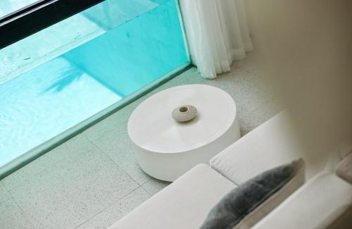 Taman Griya Villa | Chic All-White Villa with Pool and Fire Pit