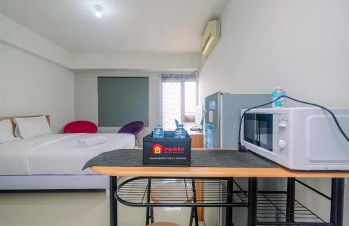 Depok Apartment | Chic and Cozy Studio Park View Condominium Apartment By Travelio