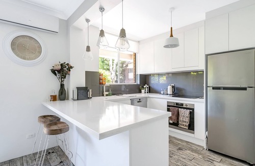 Manly Apartment | Chic designer garden apartment moments from beach!