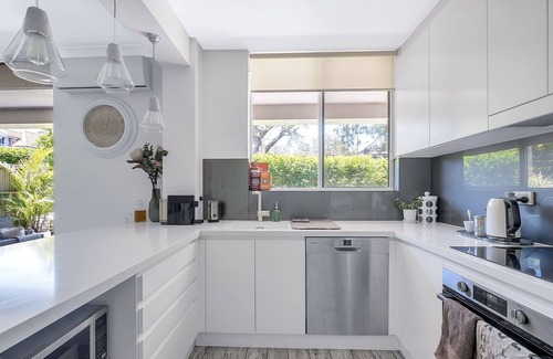 Manly Apartment | Chic designer garden apartment moments from beach!
