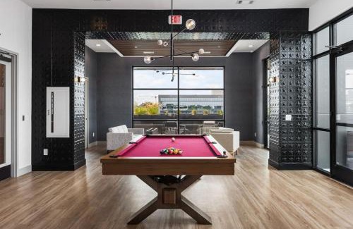 Edgehill Apartment | Chic Music Row Condo Rooftop Deck with City View Gym Office and More
