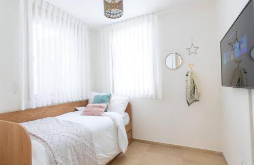 Neve Tzedek Apartment | Chic Neve Tzedek 3BR & PARKING with Spacious Terrace - By BerryStays