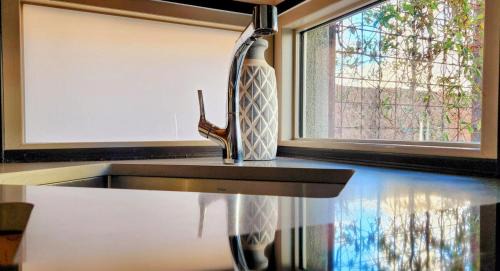 Raynolds Addition Apartment | Chic Townhome Haven rooted Downtown