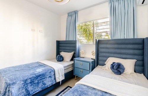 Llanos de Gurabo I Apartment | Chic Urban Retreat with Pool, Gym, & Free Parking
