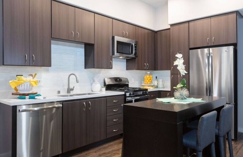 Downtown Condo | Chic Urban Living w Pool & Fire Pit at 300 Railway