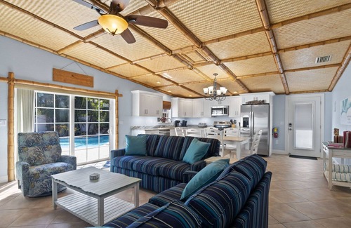 Holmes Beach House | Chiki Tiki West: Eclectic Beach House, Tiki Bar & Pool, 2.5 Blocks to Beach by Anna Maria Life