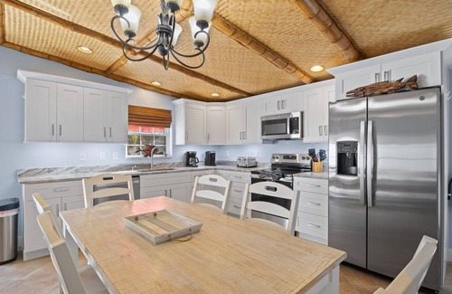 Holmes Beach House | Chiki Tiki West: Eclectic Beach House, Tiki Bar & Pool, 2.5 Blocks to Beach by Anna Maria Life
