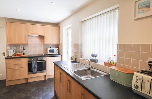 West Cliff Cottage | CHURCH VIEW, pet friendly, with a garden in Whitby