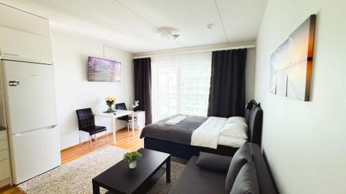 Oulu Apartment | City center 1R studio with perfect view, parking