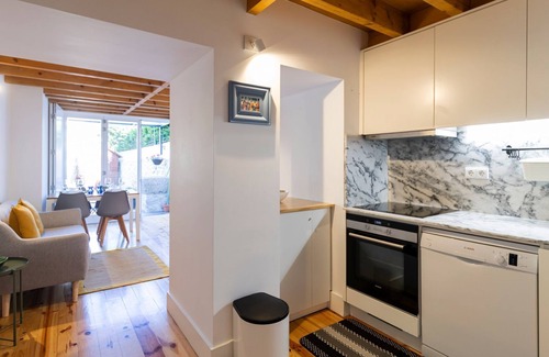 Centro / Baixa Apartment | City Center Duplex w/Patio by LovelyStay