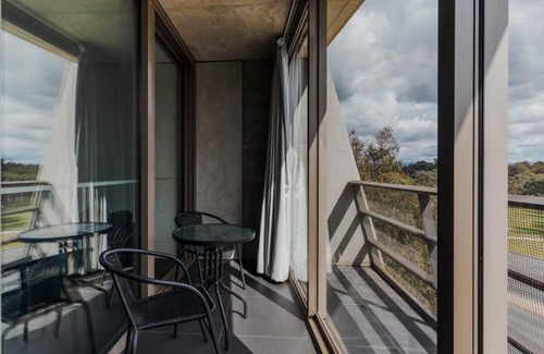 City West Apartment | City Centre Pad with Balcony and Leafy Park Views