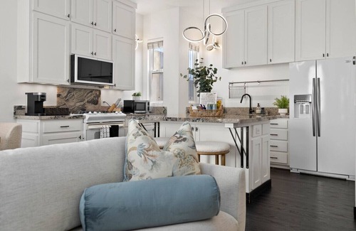 Cortez Hill Apartment | City Lights & Rooftop Nights by Rather Be Properties