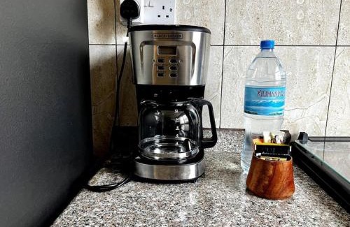 Dodoma Apartment | City Retreat with 2 Ensuite Bedrooms and Home Office