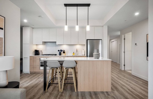 Eau Claire Apartment | City Sophistication w 2 BR River View, Parking, Office