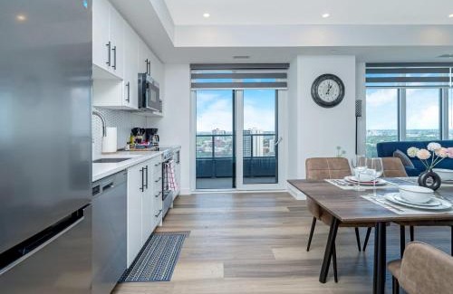 Kitchener Apartment | City View 1BR Condo - King Bed & Private Balcony