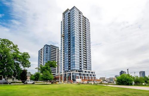 Kitchener Apartment | City View 1BR Condo - King Bed & Private Balcony