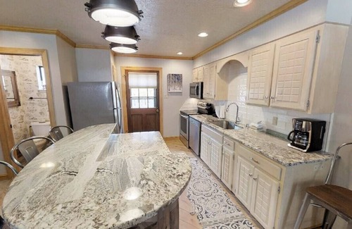 Red River House | CJ Townhouse 3 - On the River - In Town - Across from the Fishing Ponds - Wood B