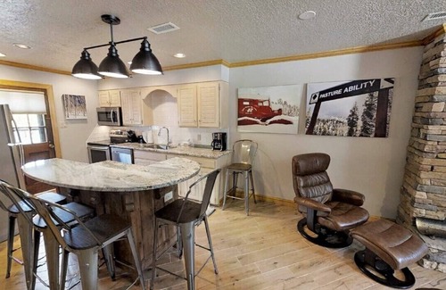 Red River House | CJ Townhouse 3 - On the River - In Town - Across from the Fishing Ponds - Wood B