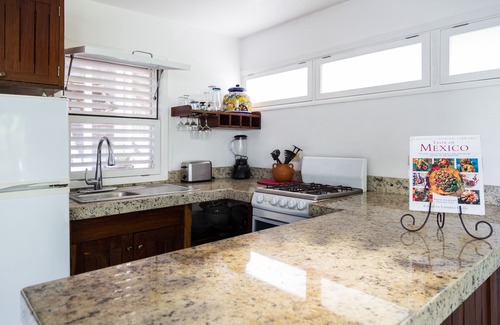 Downtown Condo | Classic Caribbean suite at the Plantation house! Family and pet friendly