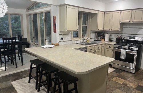 Waukazoo Woods House | Classic home in the Waukazoo Woods Holland Michigan. Lake-Family-Activity Ready