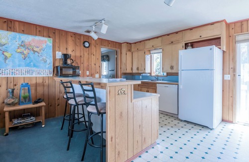 Waldport House | Classic Oregon Beach Home has Oceanview Deck, Fenced Yard, Fire Pit, and Hot Tub