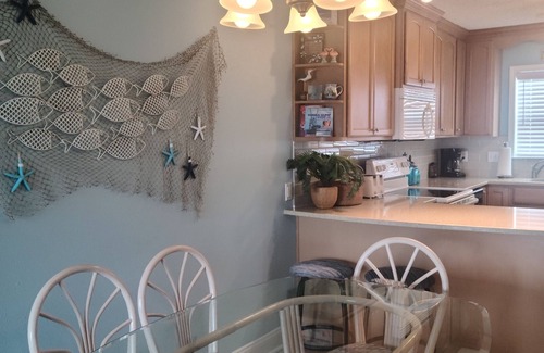 Pensacola Beach Condo | CLEAN and NEWLY Renovated! Relaxed and Fun Decor. 2B/2B with W/D