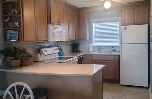 Pensacola Beach Condo | CLEAN and NEWLY Renovated! Relaxed and Fun Decor. 2B/2B with W/D
