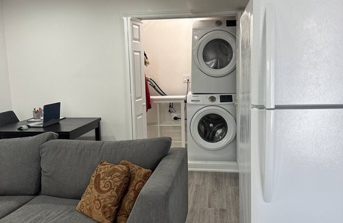 Hurontario House | Clean, bright, furnished walkout basement apartment. 5 minutes to Hwy 401 & 403.