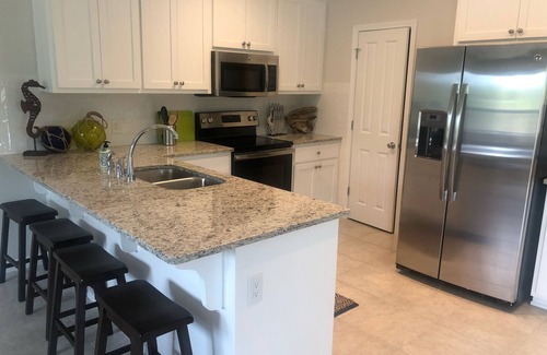 St. George Island House | Close to Beach and Bay! Private Pool, outdoor living area, Pets welcome!