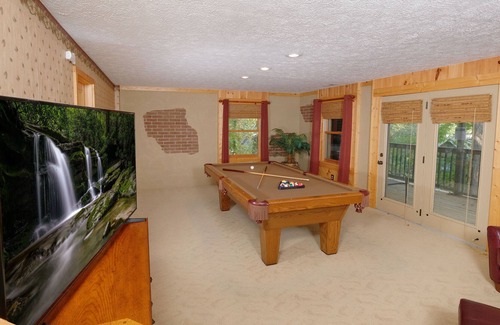 Pigeon Forge Ski Chalet | Close to Pigeon Forge-walking distance to Swimming Pool Access-gas fire pit-game room