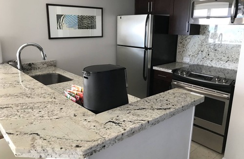 Waikiki Apartment | Close to shopping, dining and just steps from a sunset walk on the beach.