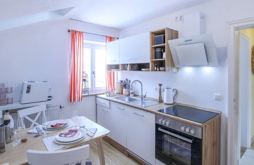 Bad Toelz Apartment | Close to the river Isar and in the charming town of Bad Tölz, this decorative vacation apartment wel