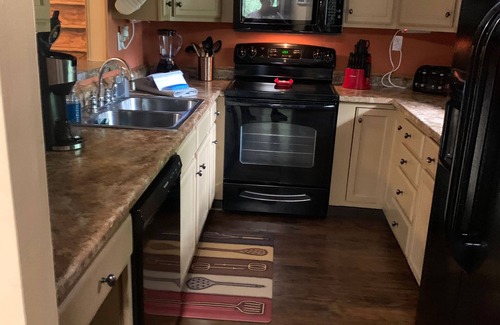 Chalet Village Condo | Close to town but in the mountains