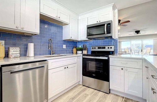 New Smyrna Beach Condo | Coastal Canine Retreat - Newly Renovated w/Pool