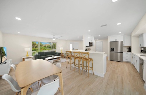 Shell Harbor House | Coastal Charm: Pool Home on Canal on East End!
