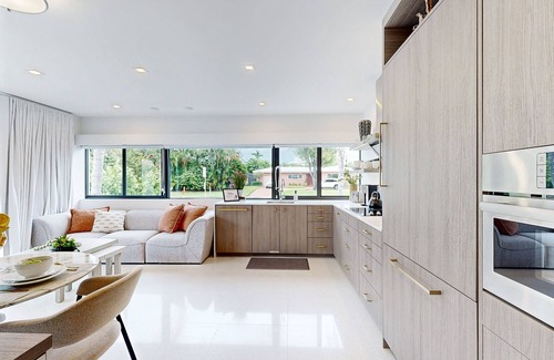 North Corals House | Coastal Chic Escape: Modern Oasis in Oakland Park